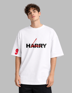Person wearing a white t-shirt with 'HARRY' printed on it against a gray background