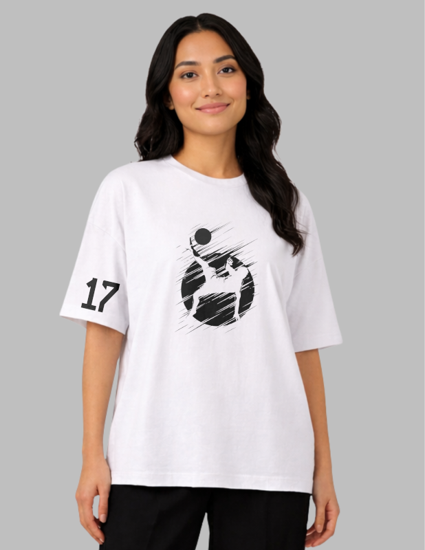 Woman wearing a white t-shirt with a black graphic design on a gray background