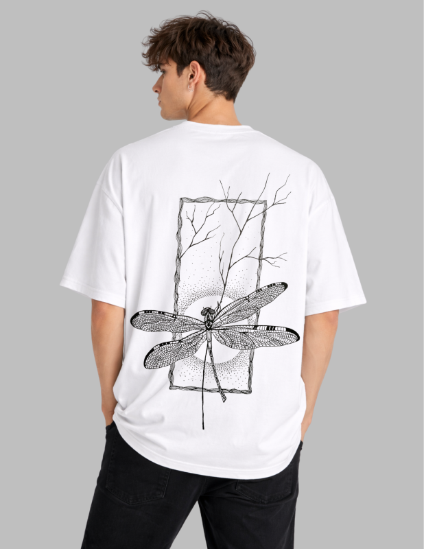 Person wearing a white t-shirt with a black dragonfly design on the back against a gray background