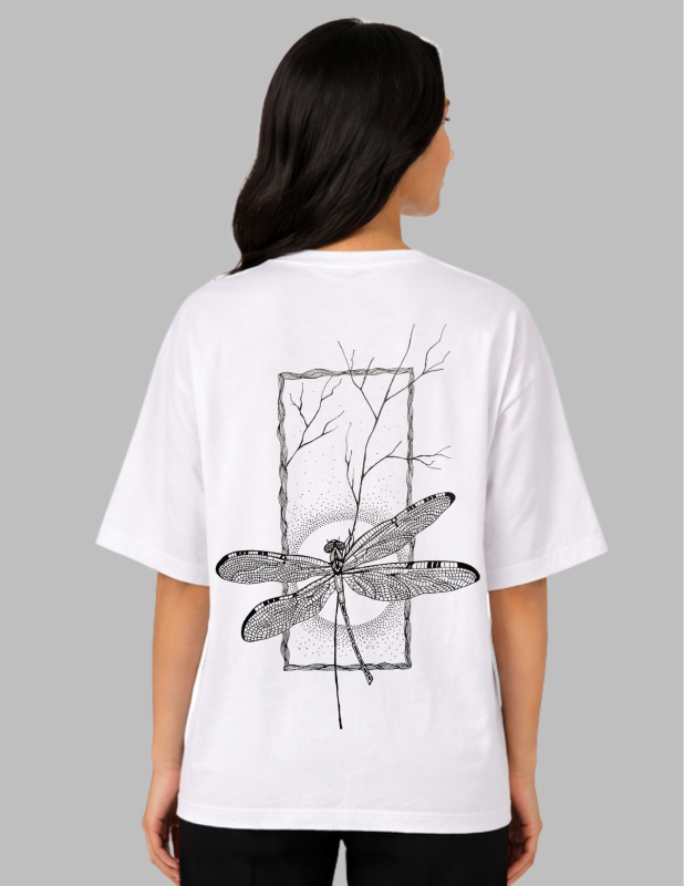 Person wearing a white t-shirt with a black dragonfly design on the back against a gray background