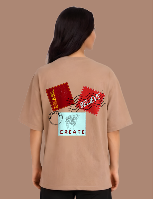Person wearing a beige t-shirt with graphic designs on the back against a brown background
