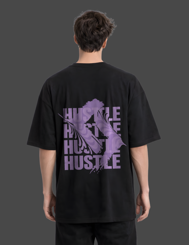 Person wearing a black t-shirt with purple graphic and text on the back