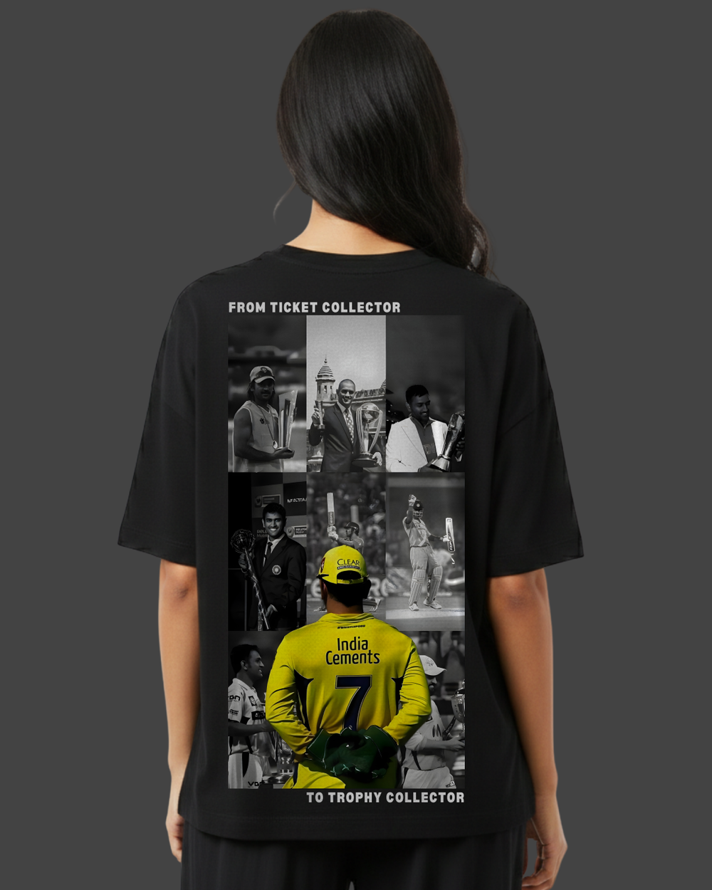 Person wearing a black t-shirt with a collage of images on the back, set against a dark background.
