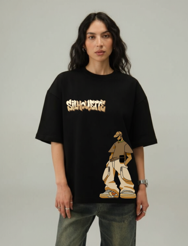Person wearing a black t-shirt with graphic design and text on a plain background