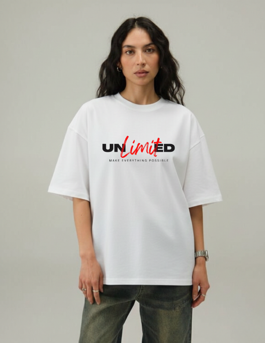 Person wearing a white t-shirt with 'UNLIMTED' text on a plain background